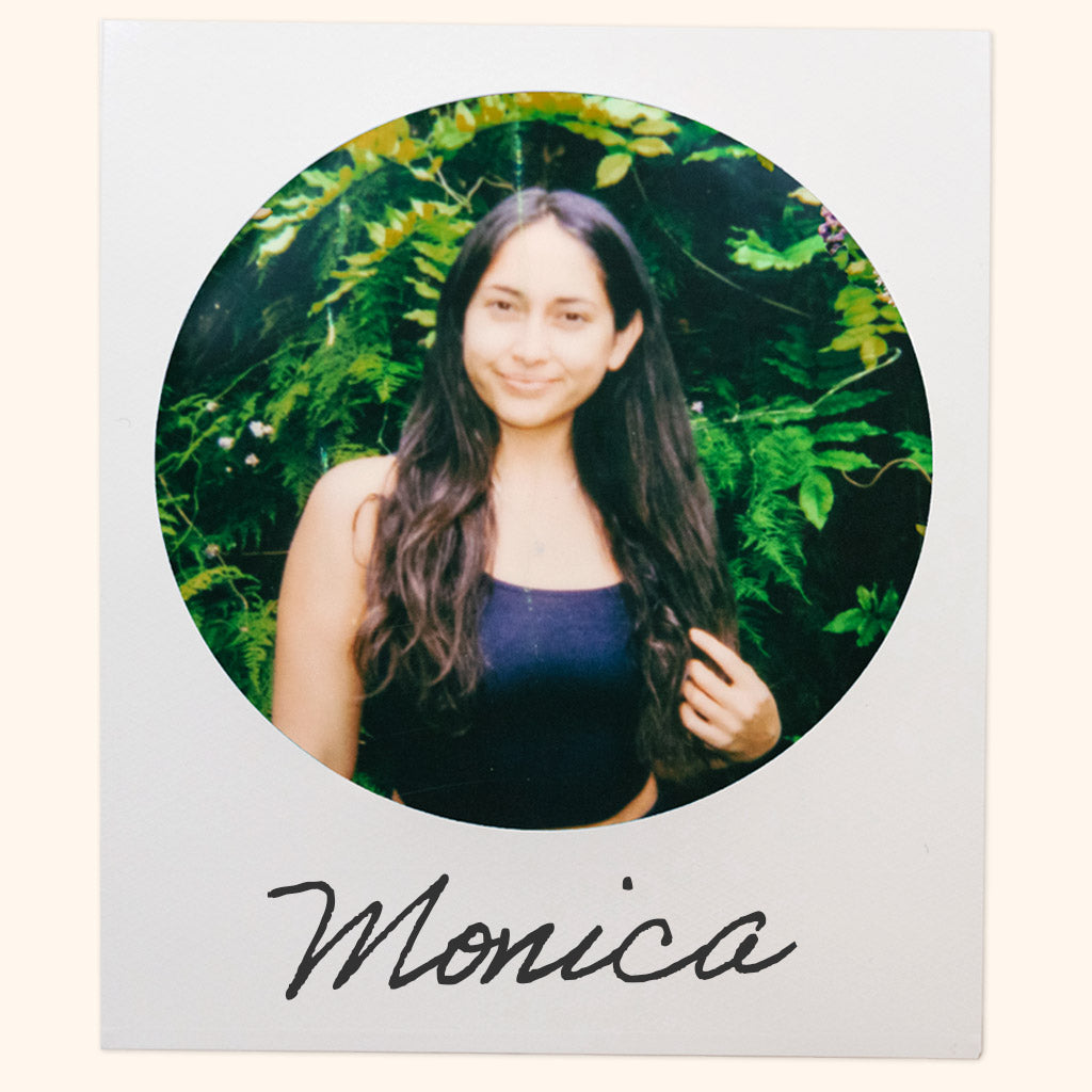 A polaroid of Cousin May's founder Monica with her name written by hand.